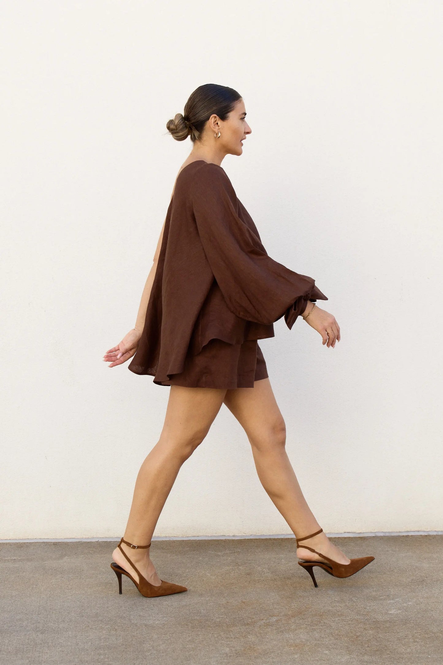 Lady walking with top and shorts