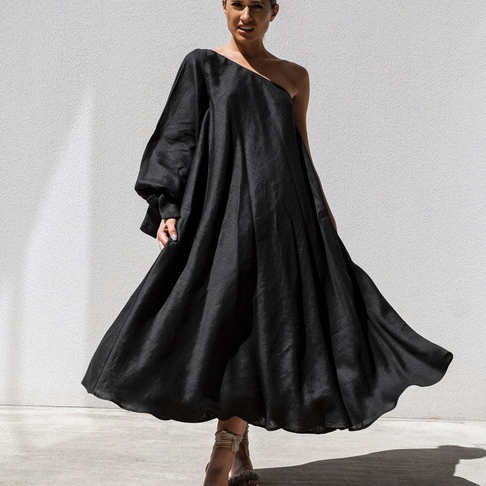 
                      
                        Black Balloon Sleeve Swing Dress
                      
                    