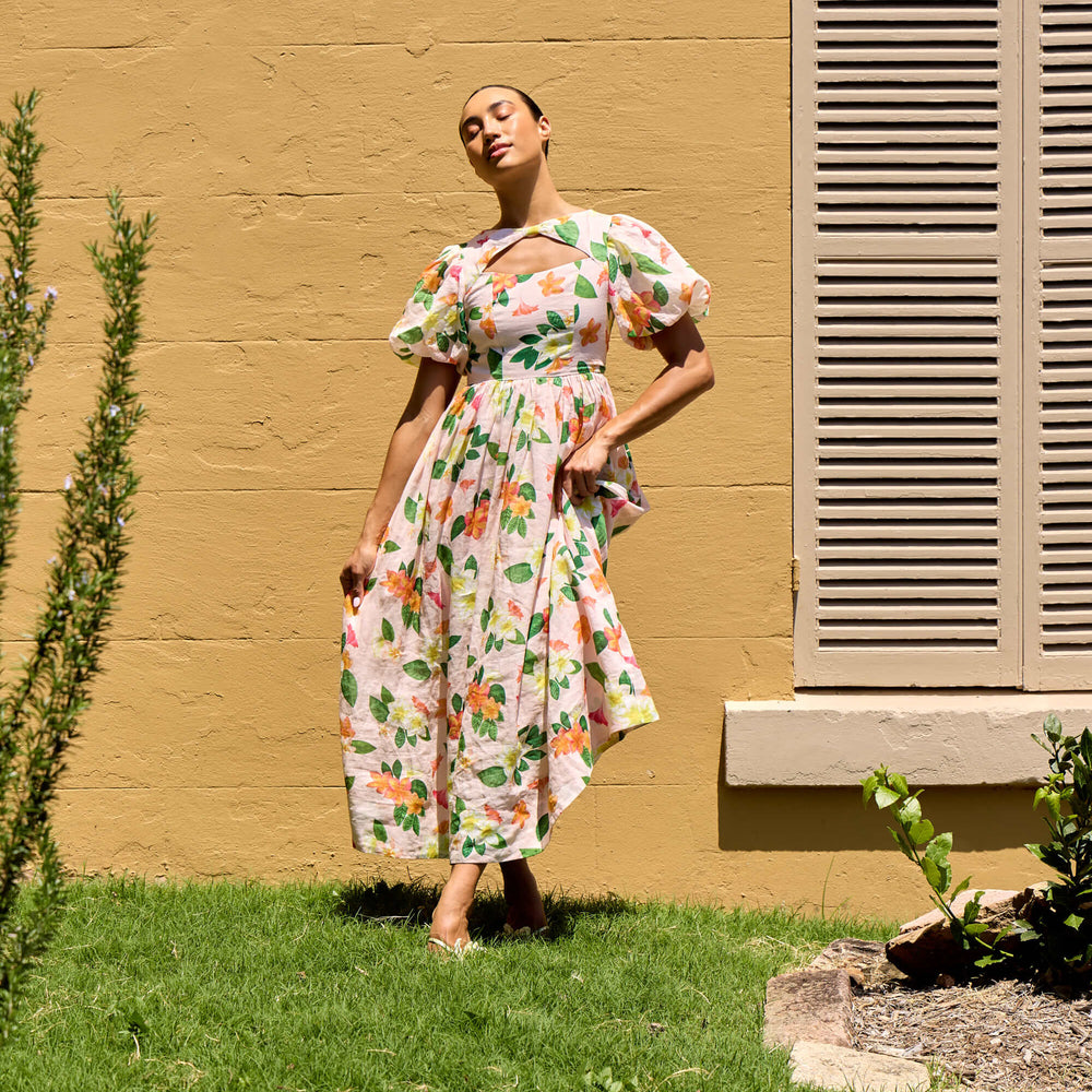 
                      
                        Frangipani Puff Sleeve Dress
                      
                    