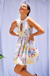 Woman wearing Tie Dye Bubble Mini Dress by Australian designer Isabella Longginou. 